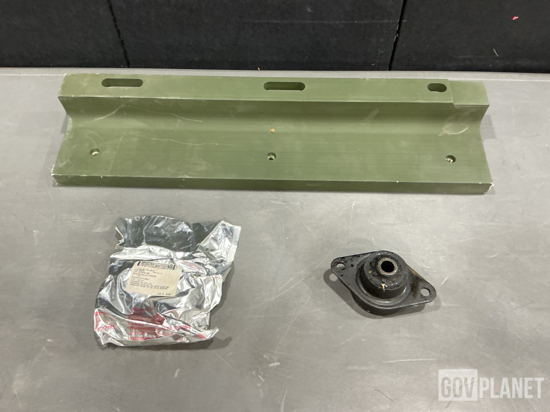 (1) Angle Bracket, (1) Bearing, (8) Resilient Mounts & Assorted Items