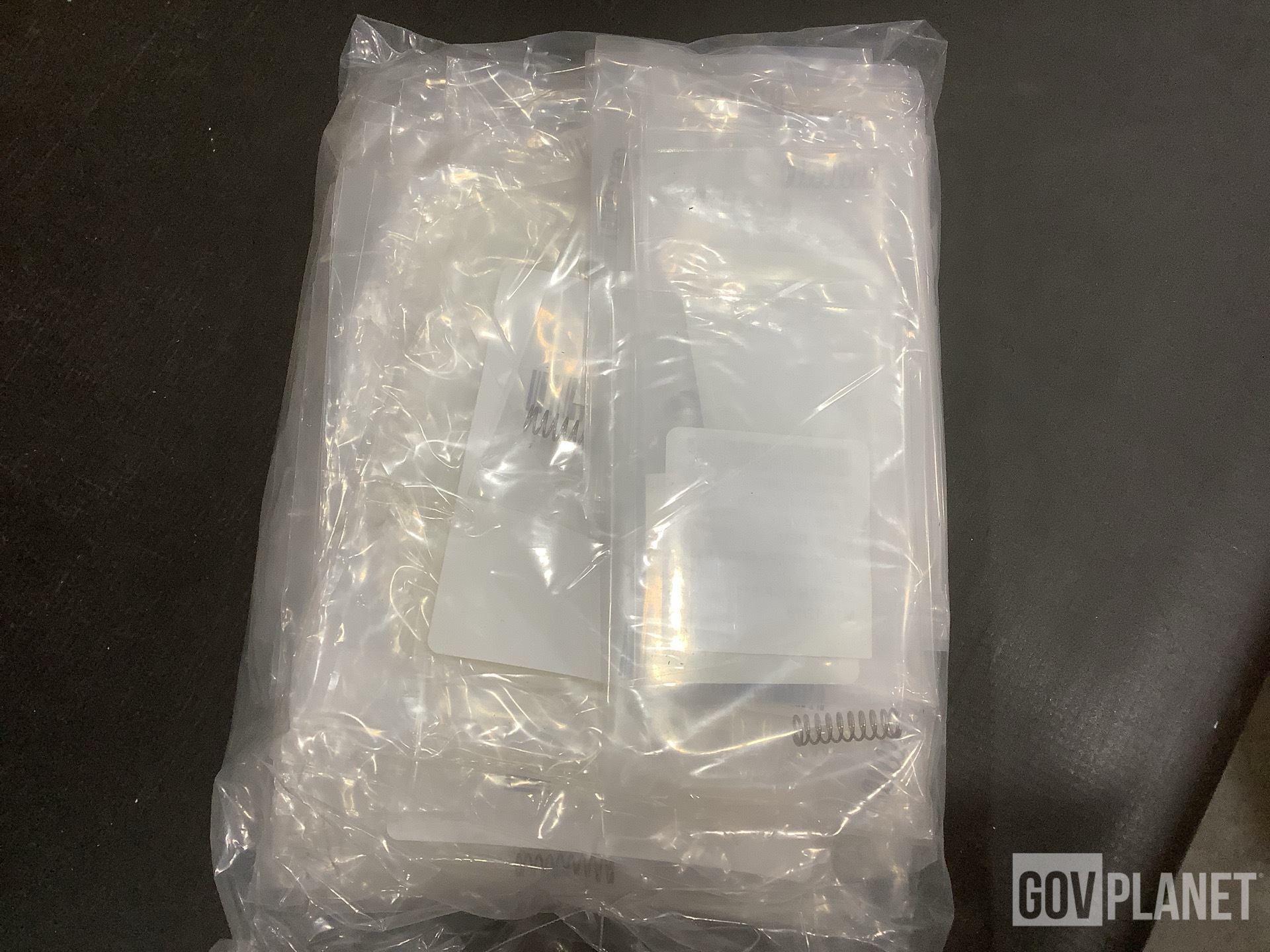 (3) Spring Holders, (490) Springs, (1) Mounting Plate & Assorted Items