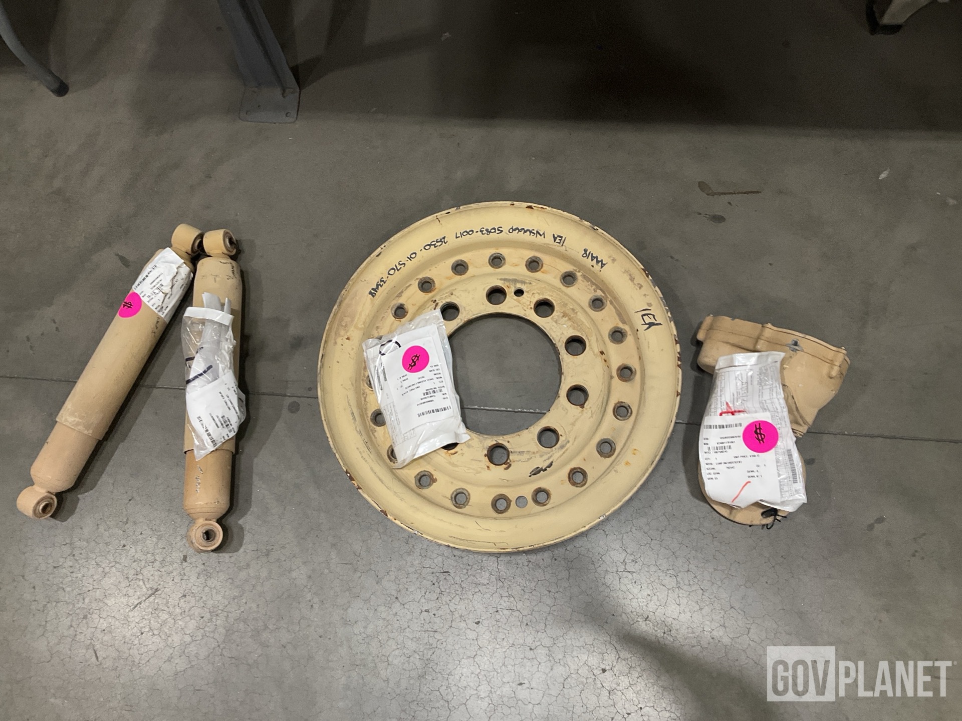 (1) Incandescent Lamp, (2) Shock Absorbers, (1) Wheel & Assorted Items