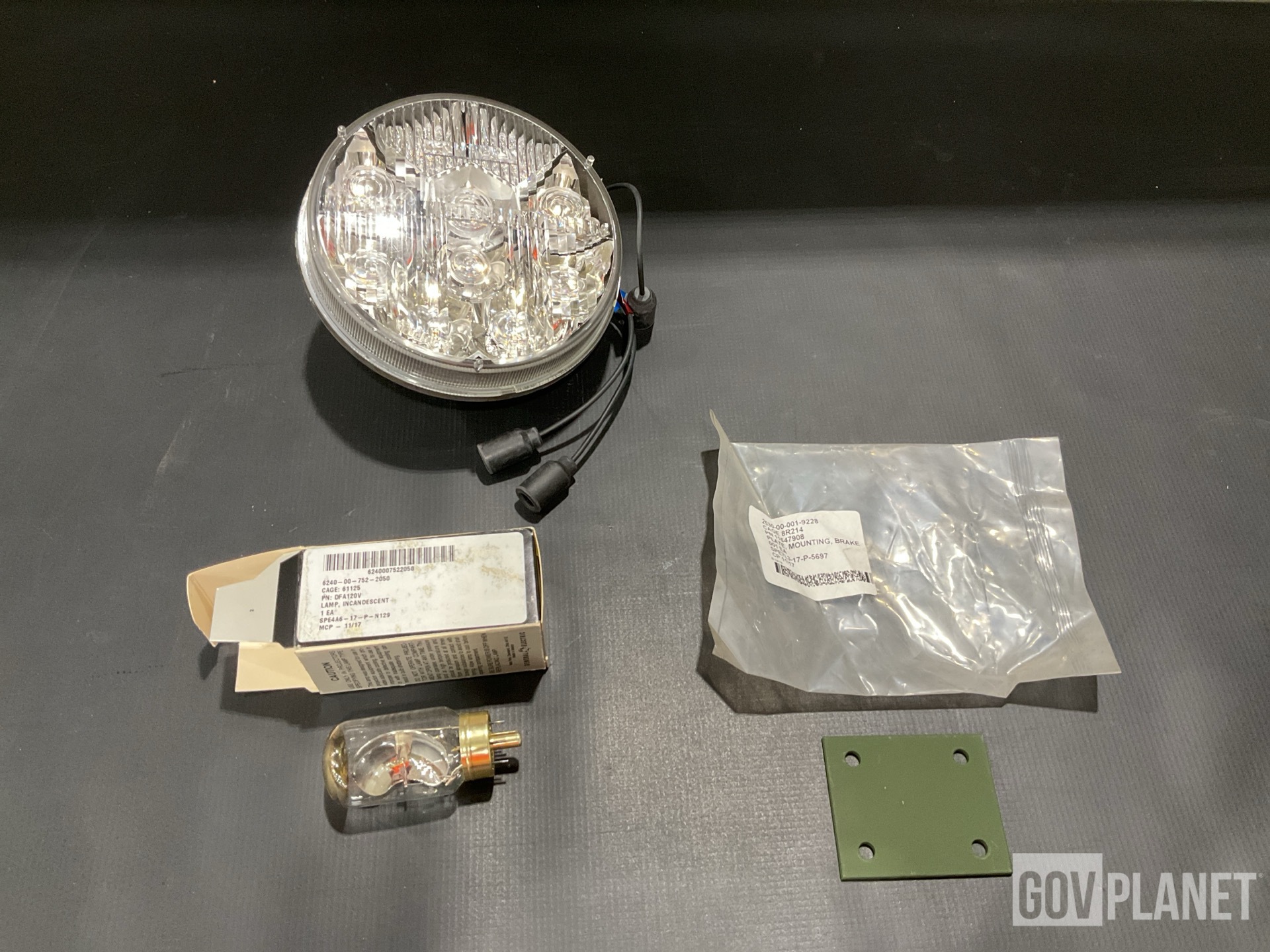 (74) Incandescent Lamps, (7) Headlights, (314) Brake Plates & Assorted Items