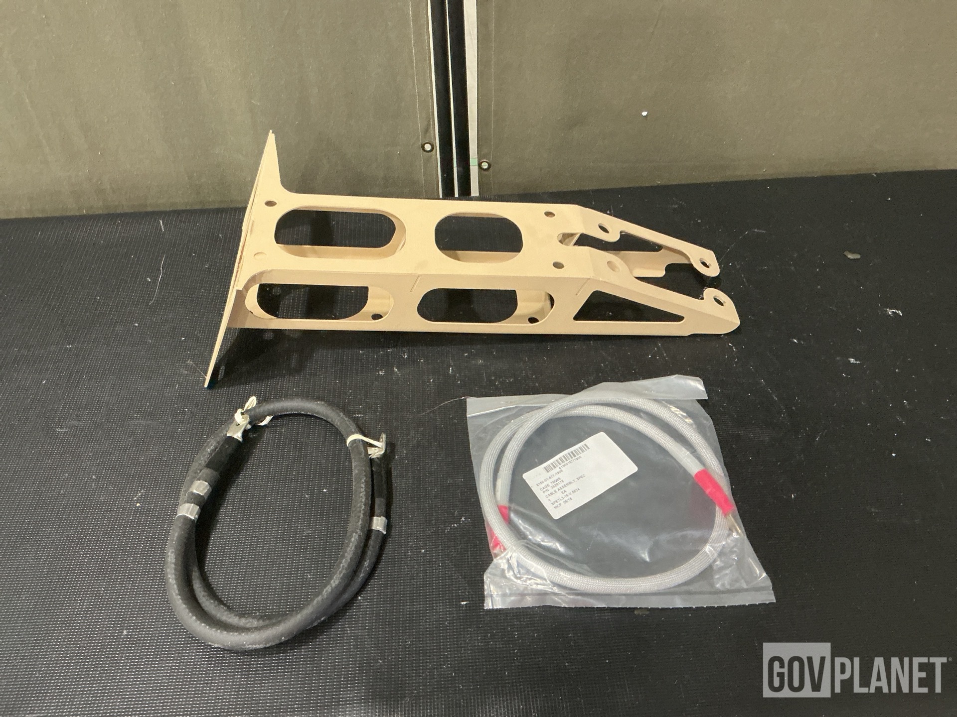 (13) Mounting Brackets, (122) Cable Assemblies & Assorted items