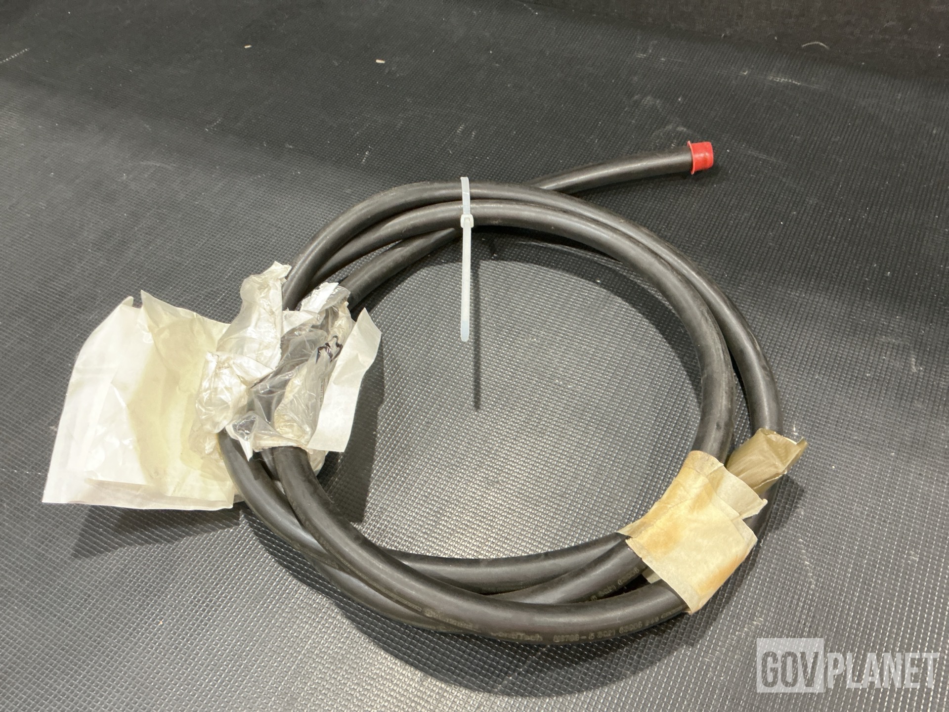 (15) Non-Metallic Hoses, (2) Relief Valves, (1) Tube Cap & Assorted Items