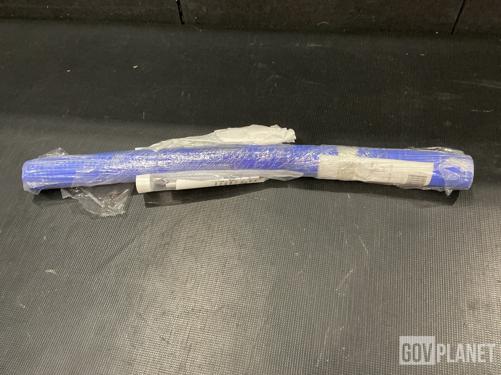 (15) Non-Metallic Hoses, (2) Relief Valves, (1) Tube Cap & Assorted Items