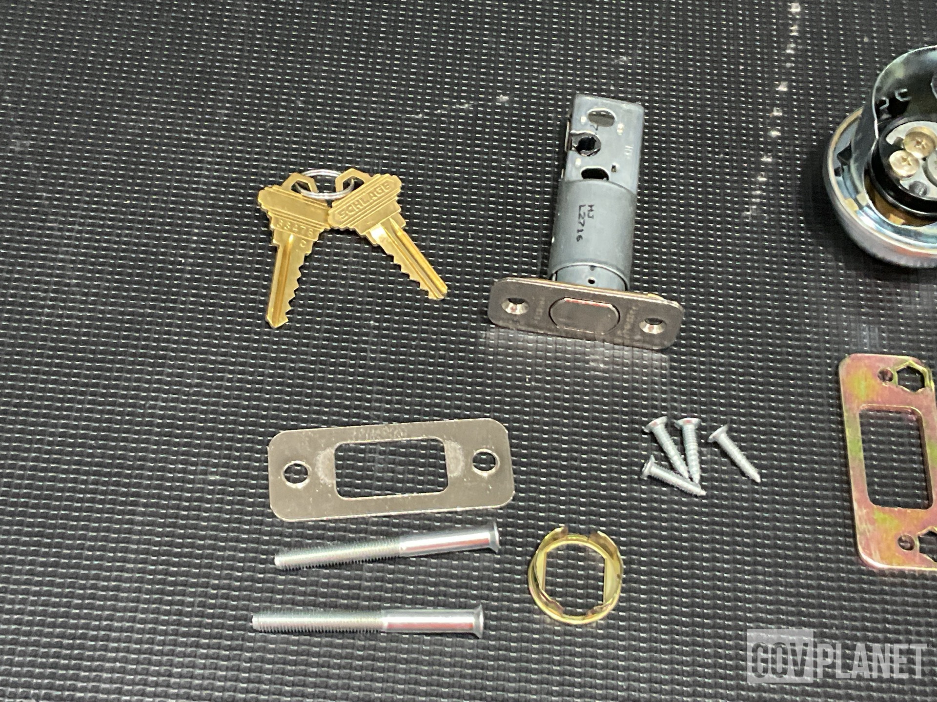 (31) Lock Sets, (37) Shear Bolts, (5) Webbing Straps & Assorted Items