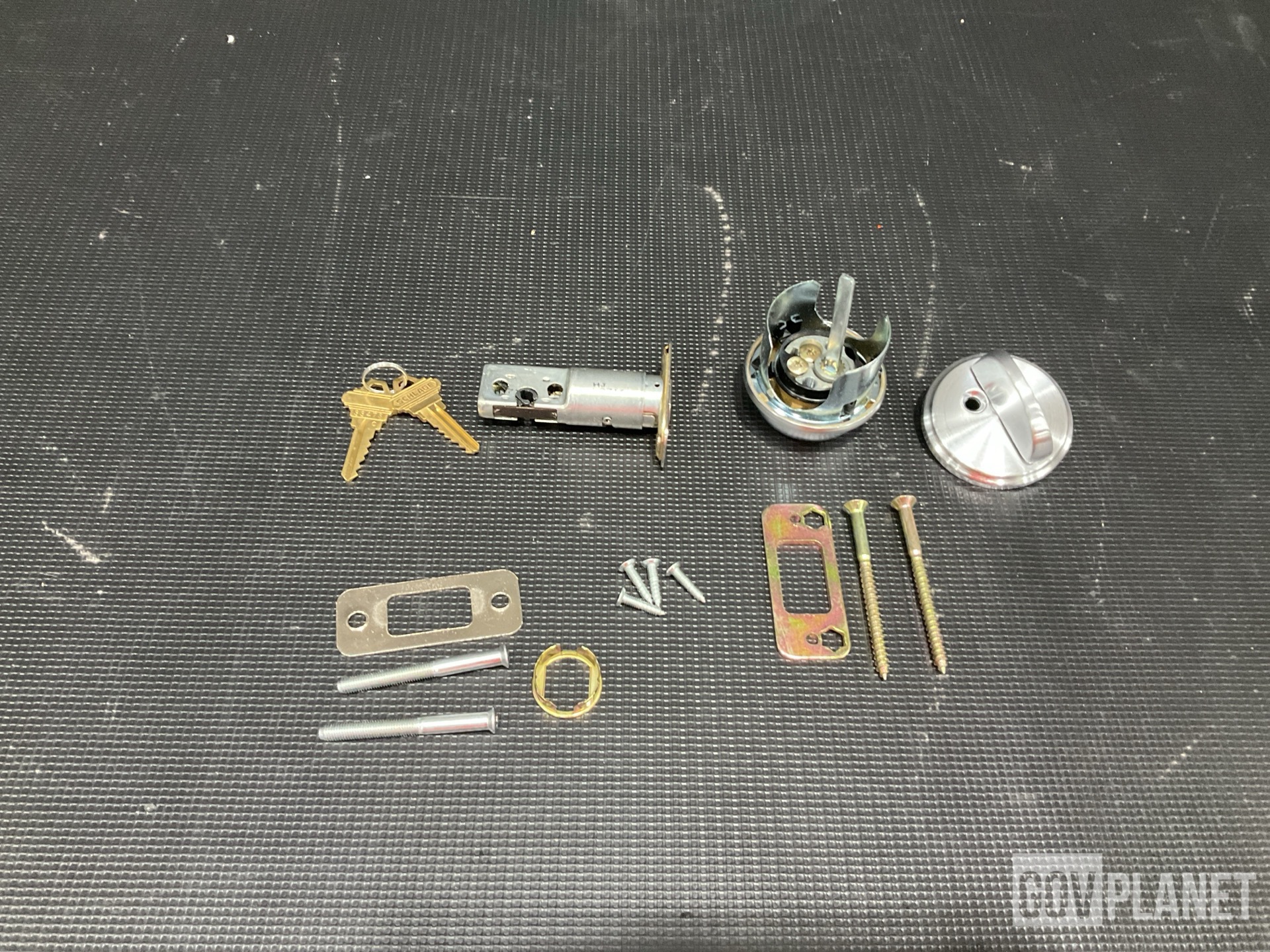 (31) Lock Sets, (37) Shear Bolts, (5) Webbing Straps & Assorted Items
