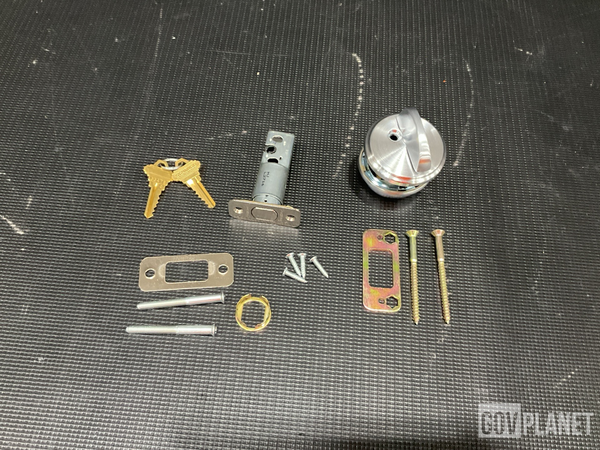 (31) Lock Sets, (37) Shear Bolts, (5) Webbing Straps & Assorted Items