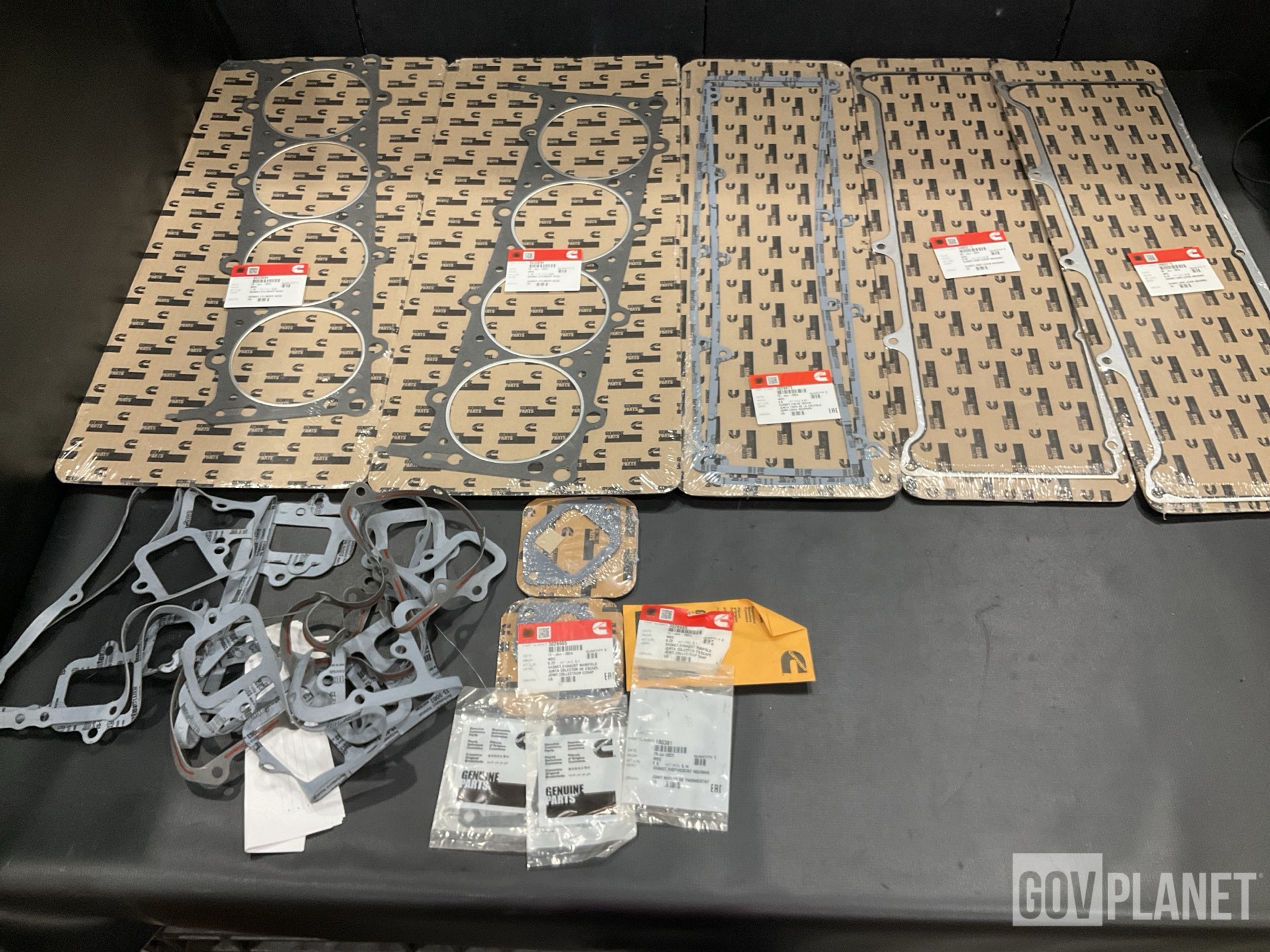(3) Headlights, (1) Gasket Set, (17) Brackets & Assorted Items