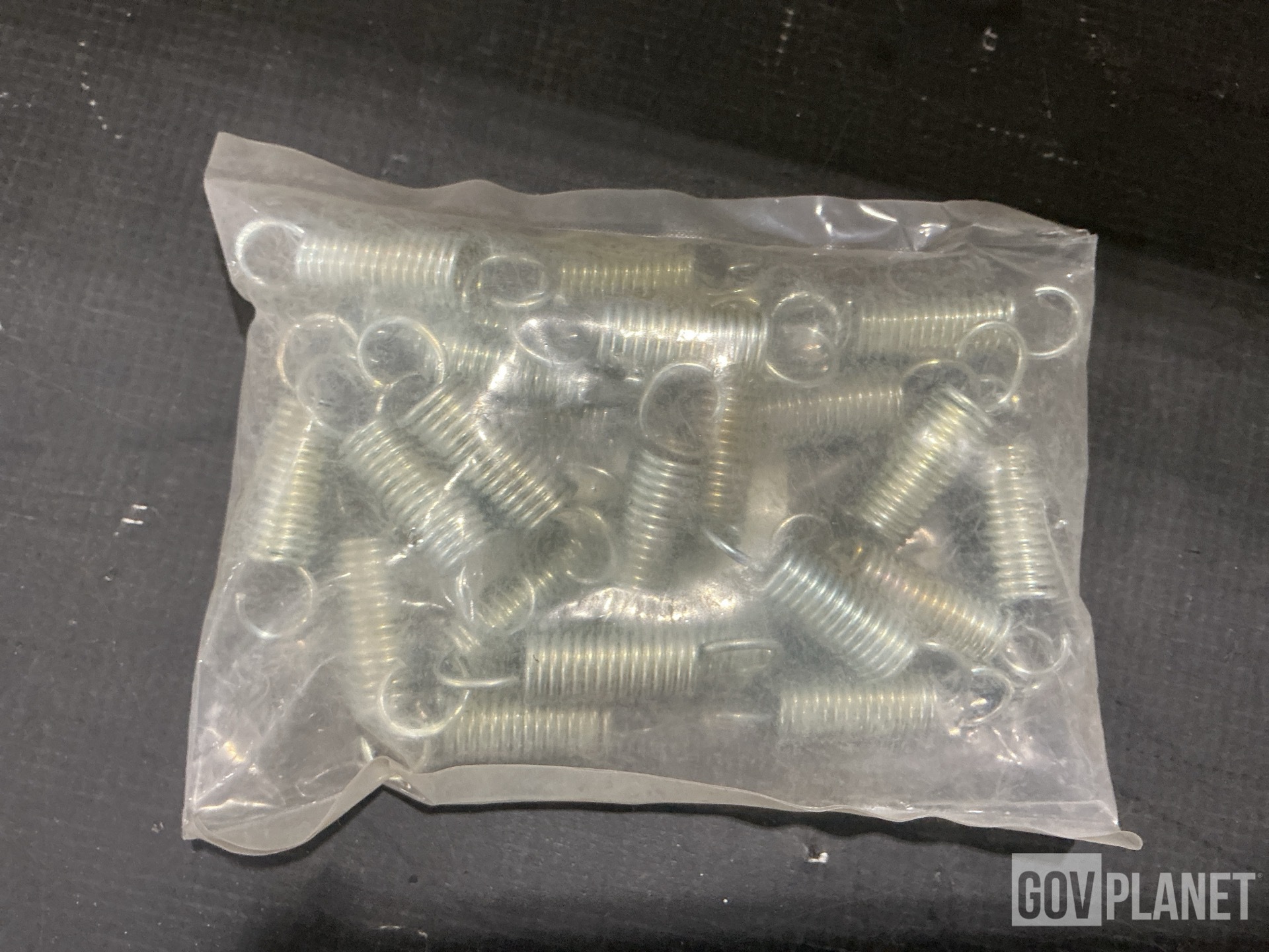 (132) Shims, (82) Extension Springs, (36) Spacers & Assorted Items