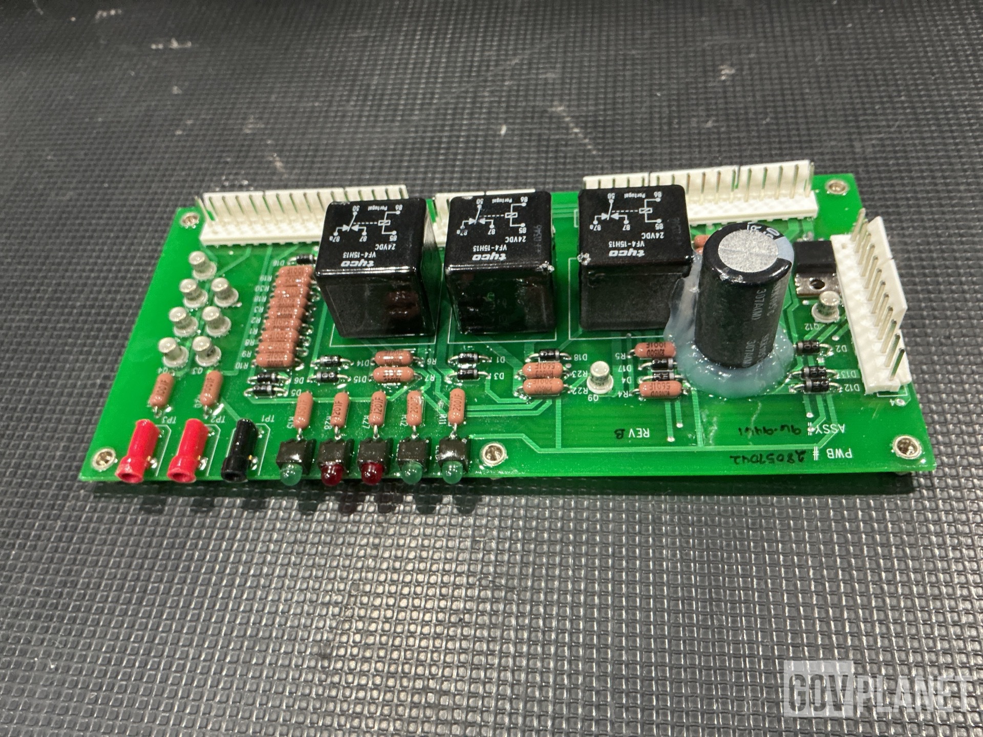 (1) Cylinder Assembly, (1) Circuit Card Assembly, (12) Modules & Assorted Items