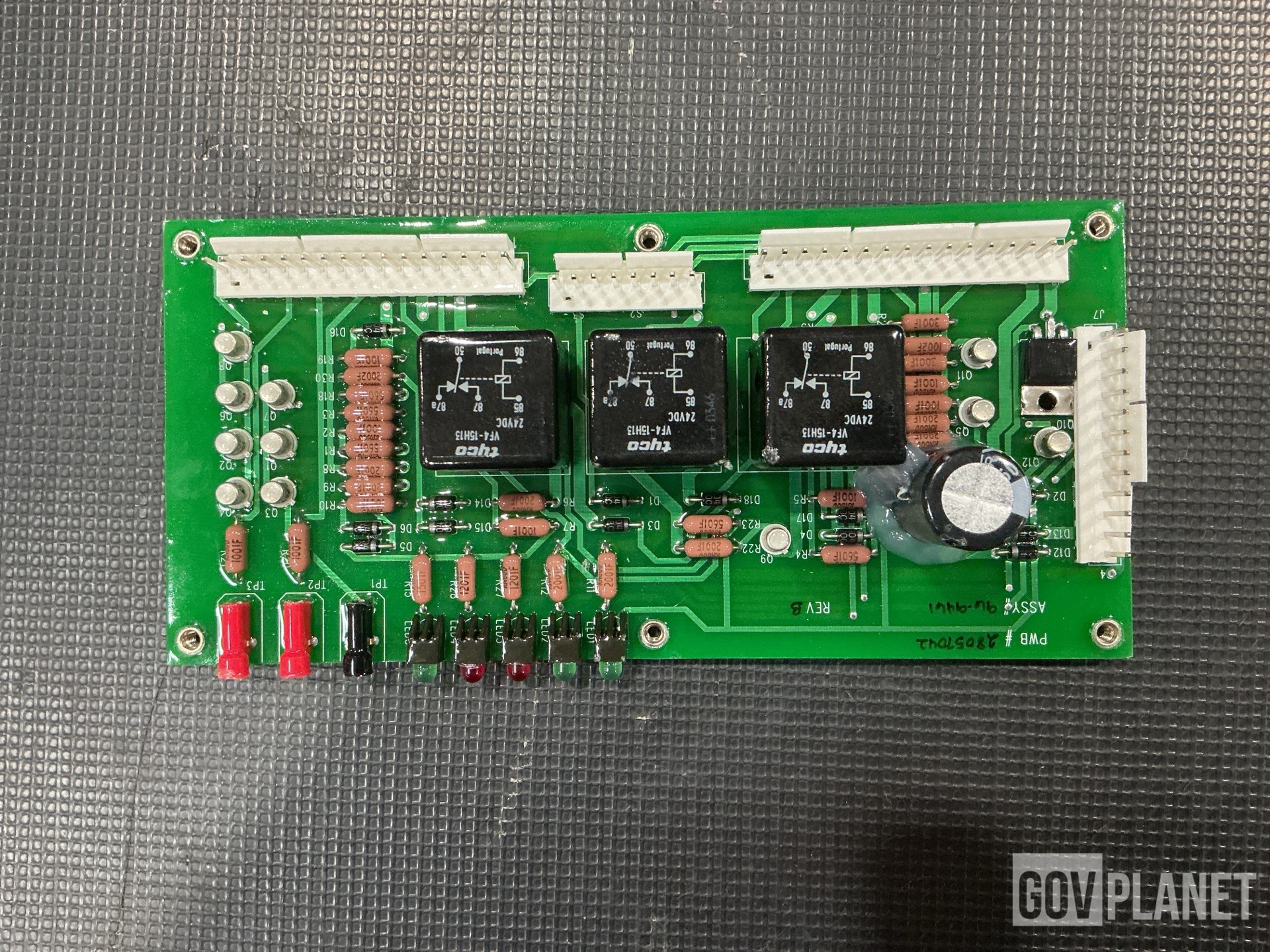 (1) Cylinder Assembly, (1) Circuit Card Assembly, (12) Modules & Assorted Items