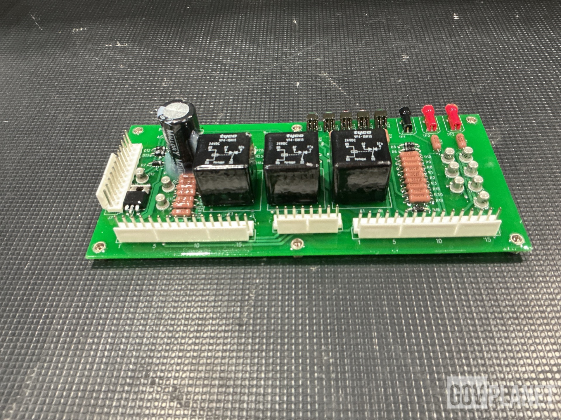 (1) Cylinder Assembly, (1) Circuit Card Assembly, (12) Modules & Assorted Items