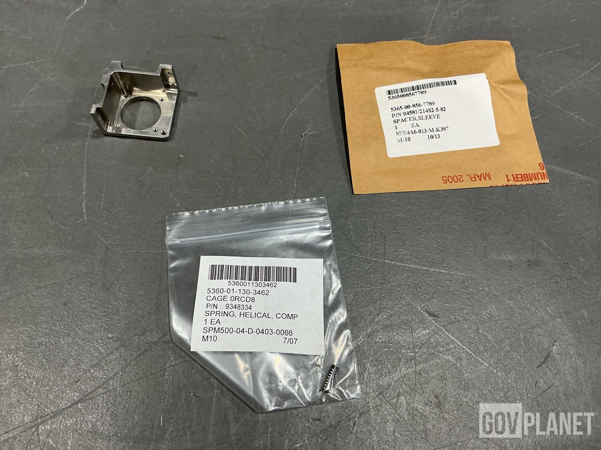 (2) Mounting Bases, (3,464) Springs, (7) Sleeve Spacers & Assorted Items