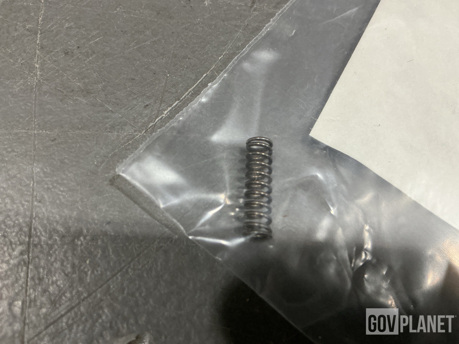 (2) Mounting Bases, (3,464) Springs, (7) Sleeve Spacers & Assorted Items
