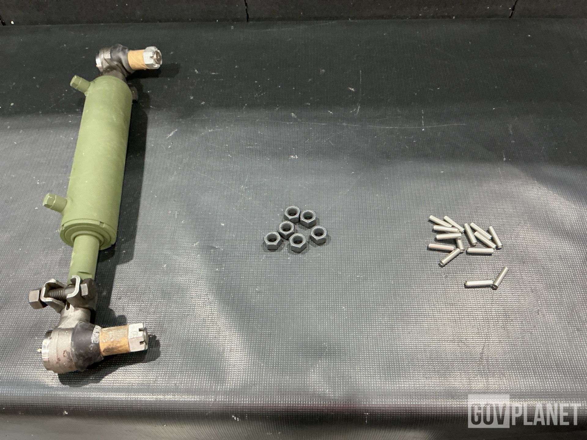 (12) Nuts & Washers, (86) Sleeve Spacers, (1) Cylinder Assembly & Assorted Items
