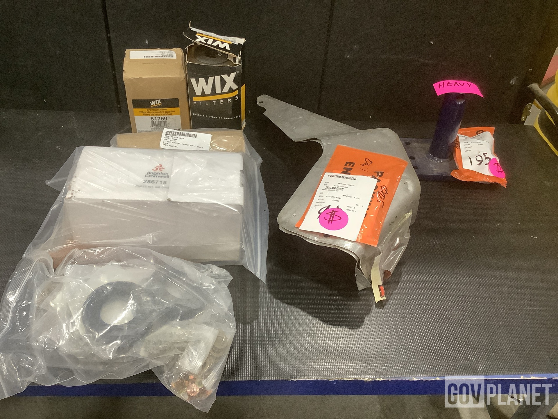 (1) Vehicular Maintenance Kit, (1) Mounting Plate & Assorted Items