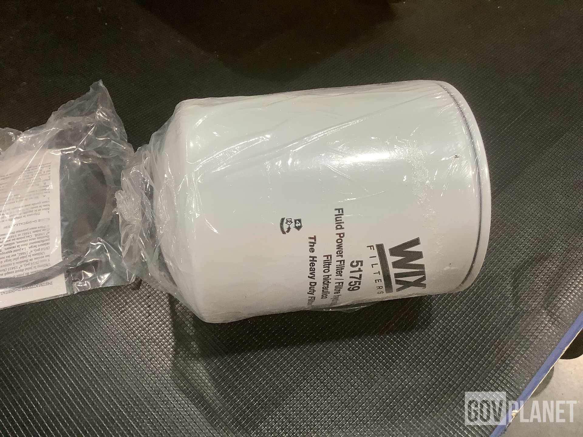 (1) Vehicular Maintenance Kit, (1) Mounting Plate & Assorted Items