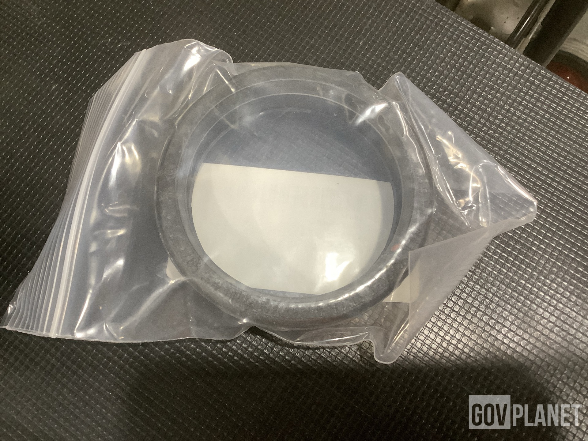 (1) Vehicular Maintenance Kit, (1) Mounting Plate & Assorted Items