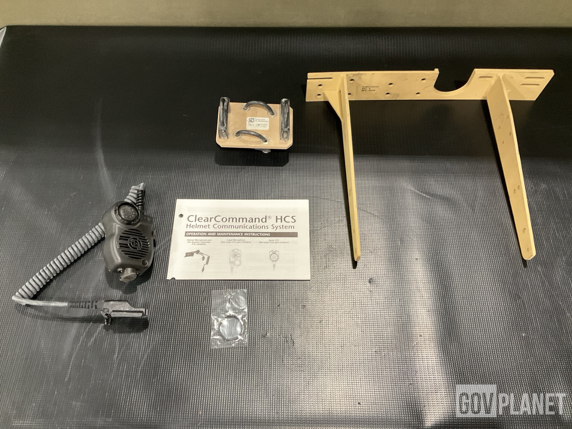 (26) Communication Systems, (2) Loop Clamps, (1) Bracket & Assorted Items
