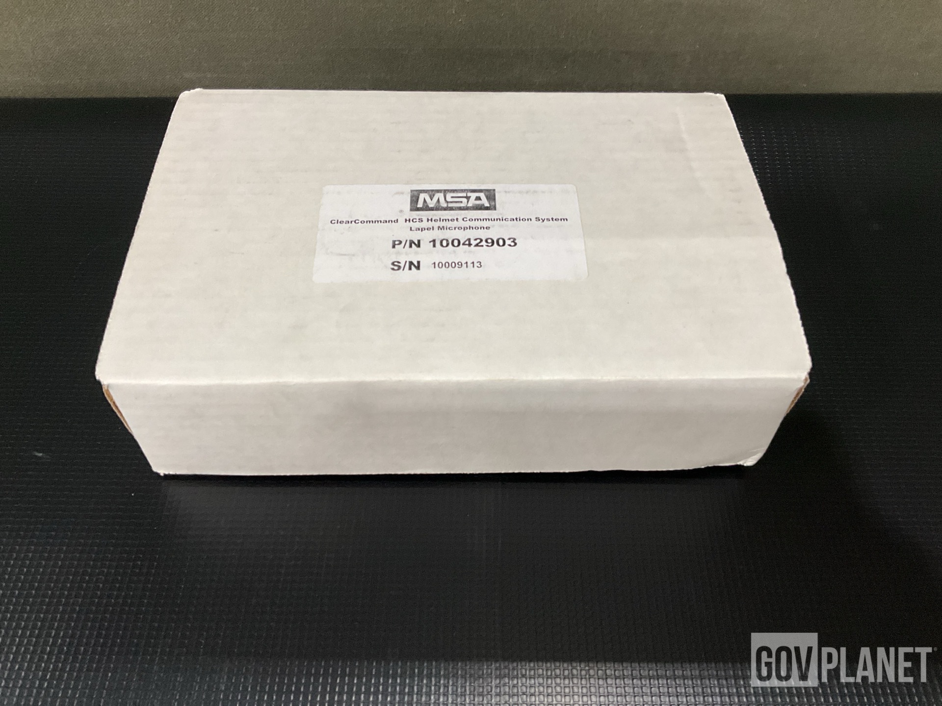 (26) Communication Systems, (2) Loop Clamps, (1) Bracket & Assorted Items
