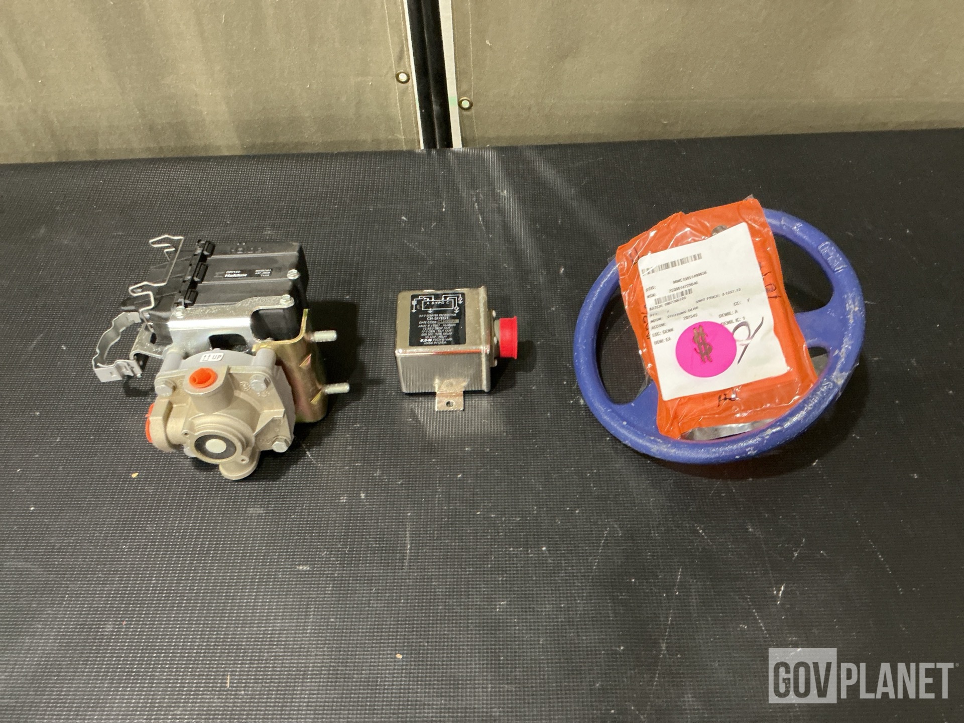 (2) Relay Valves, (1) Wheel Assembly, (1) Protector & Assorted Items