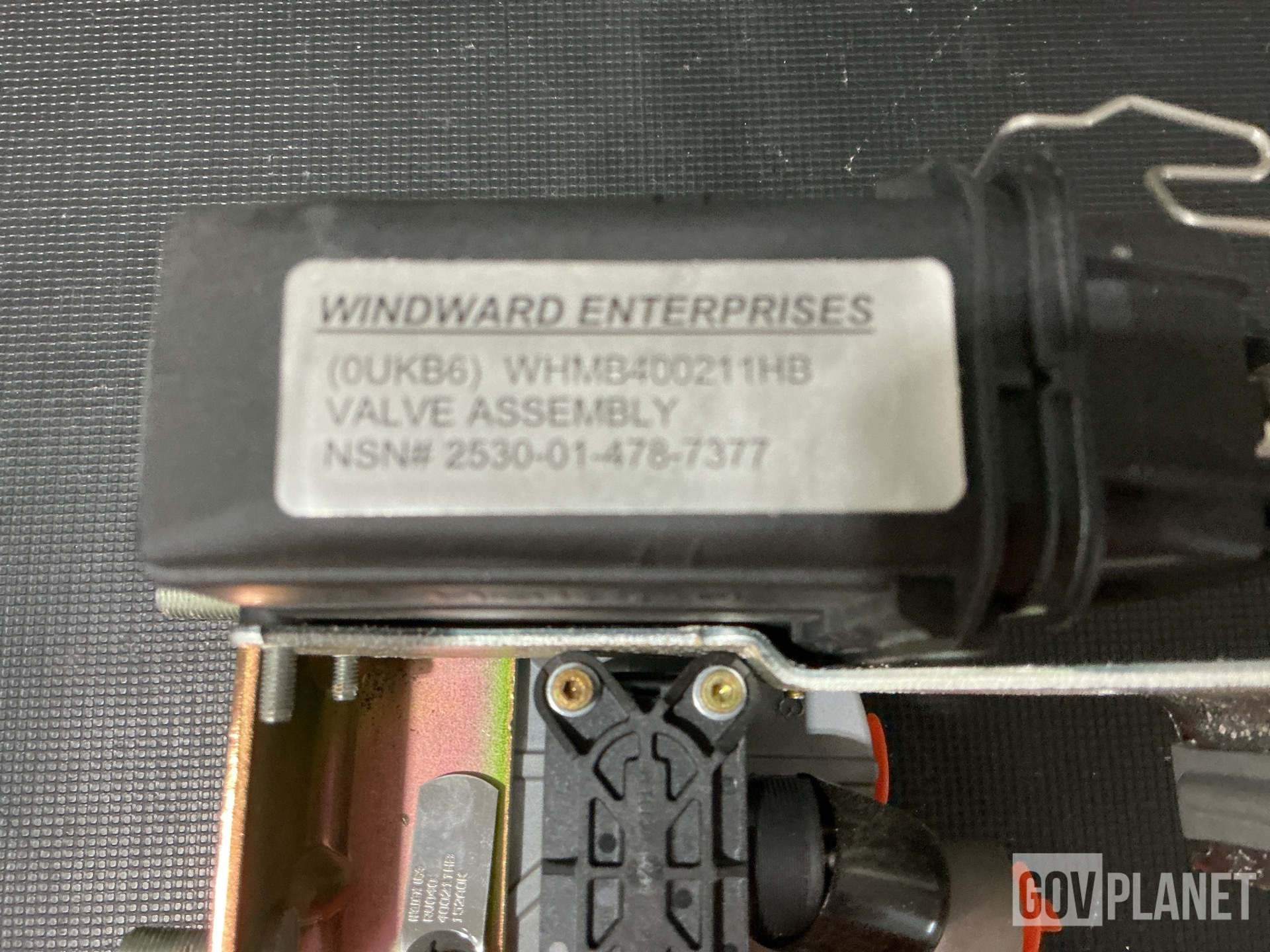 (2) Relay Valves, (1) Wheel Assembly, (1) Protector & Assorted Items