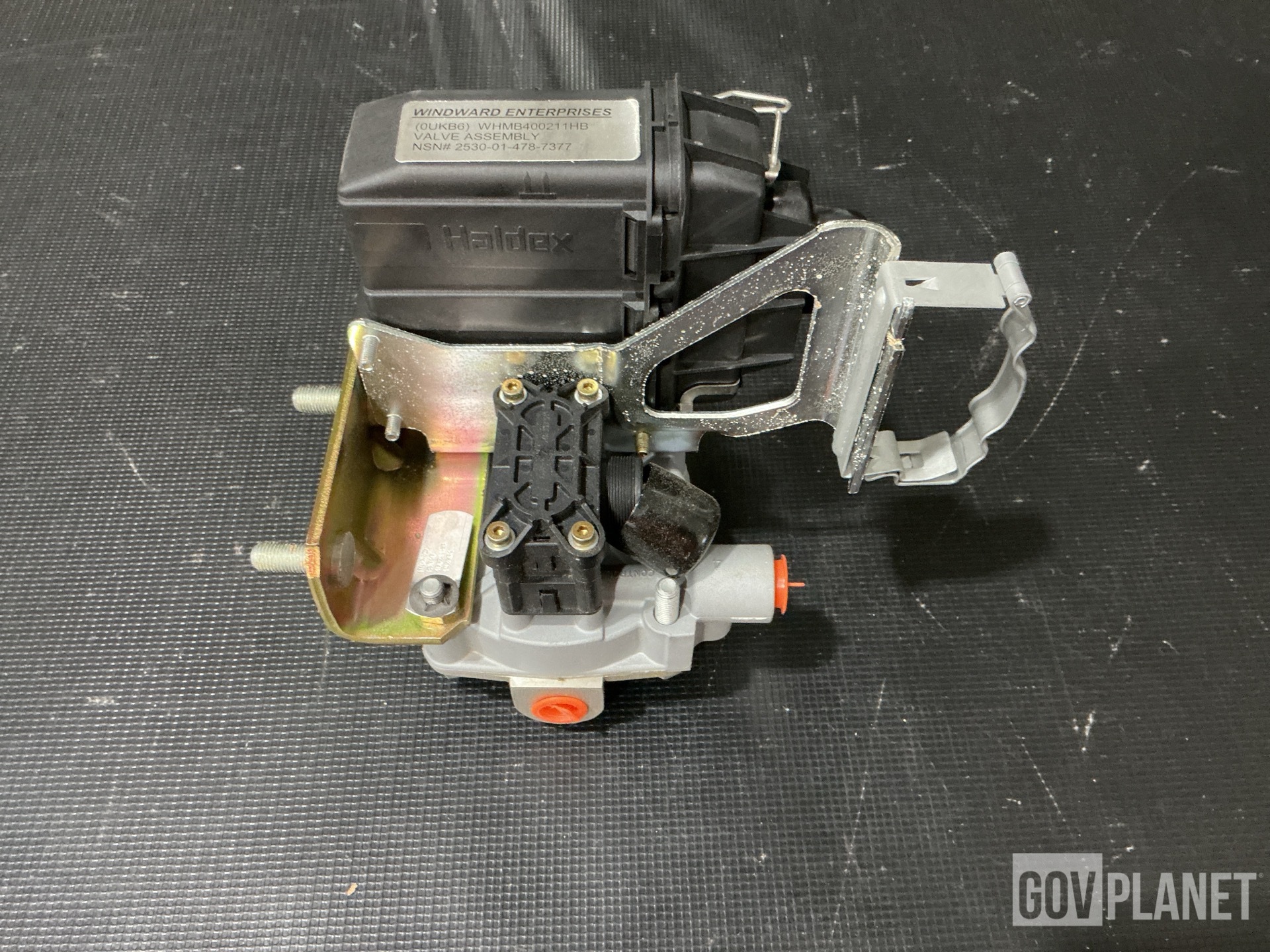 (2) Relay Valves, (1) Wheel Assembly, (1) Protector & Assorted Items
