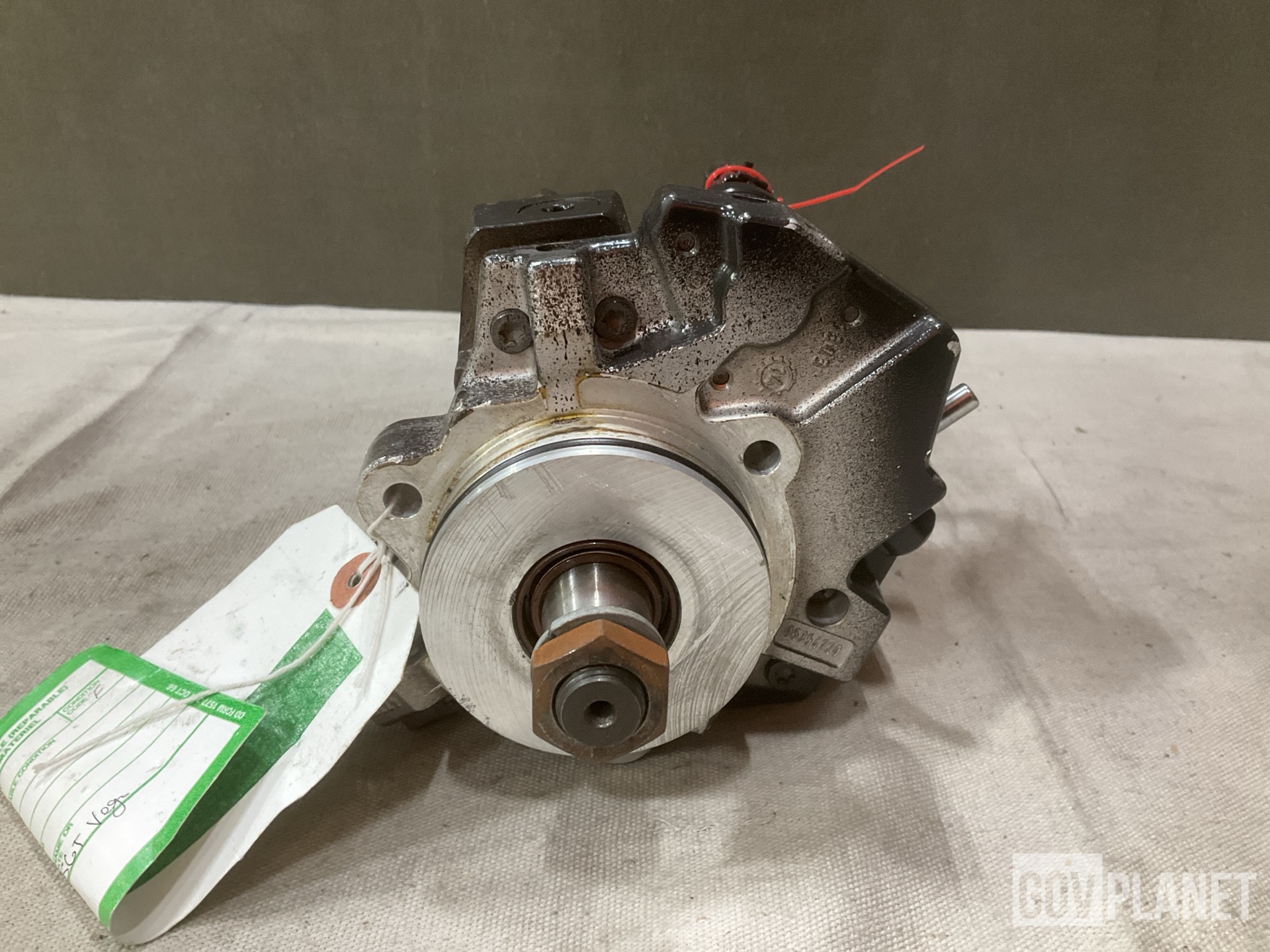 (1) Footrest, (1) Fuel Metering Pump & (18) Oil Filters & Assorted Items