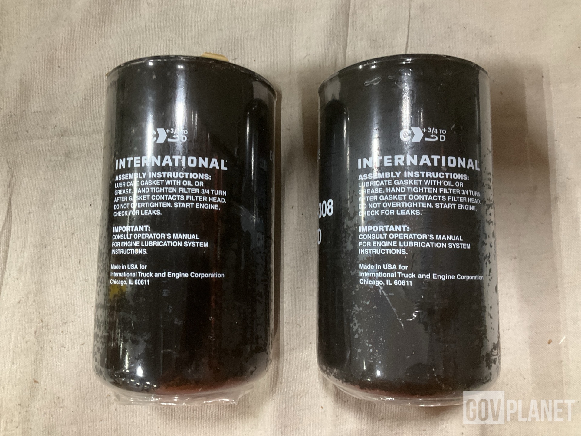 (1) Footrest, (1) Fuel Metering Pump & (18) Oil Filters & Assorted Items
