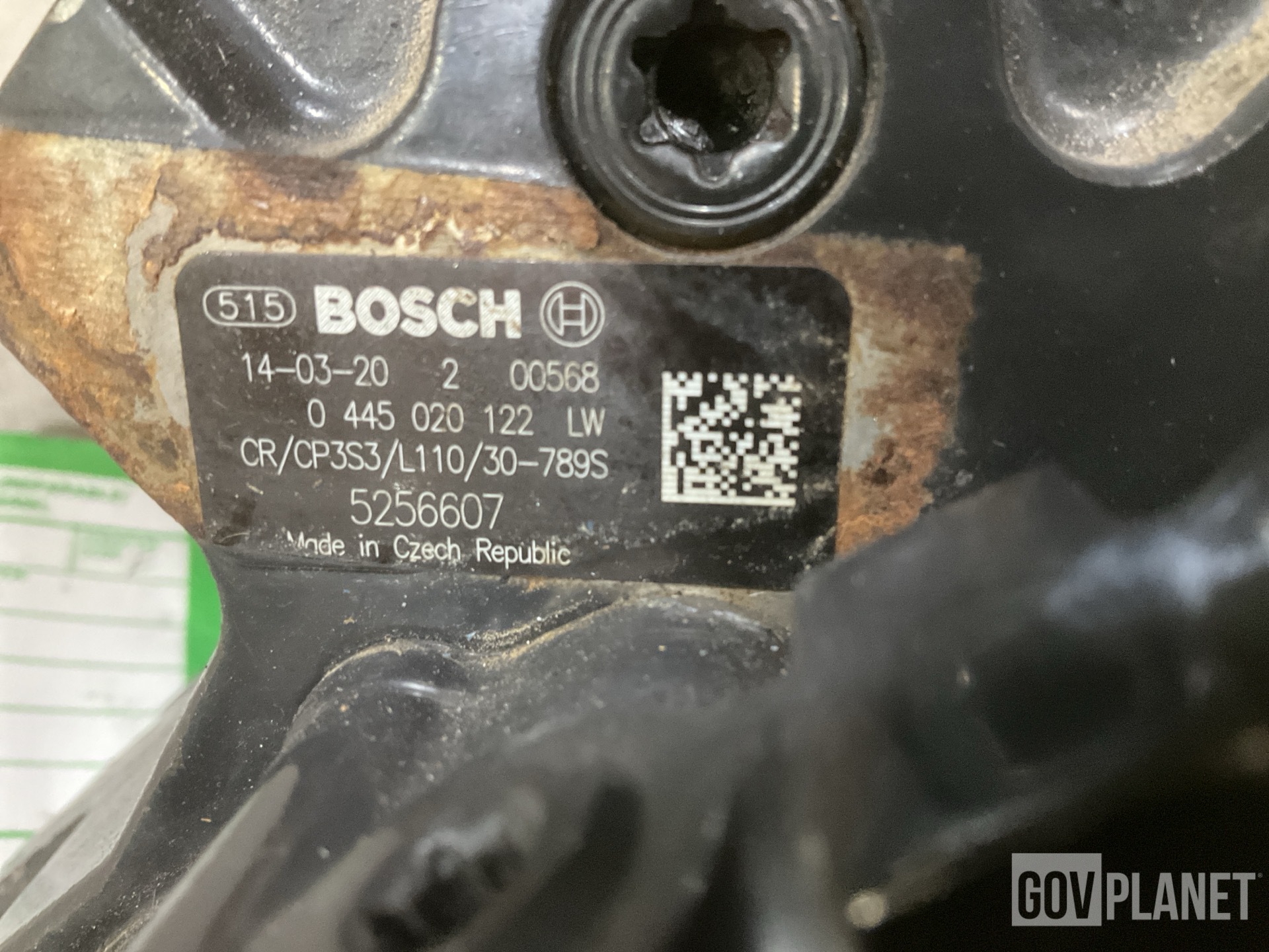 (1) Footrest, (1) Fuel Metering Pump & (18) Oil Filters & Assorted Items