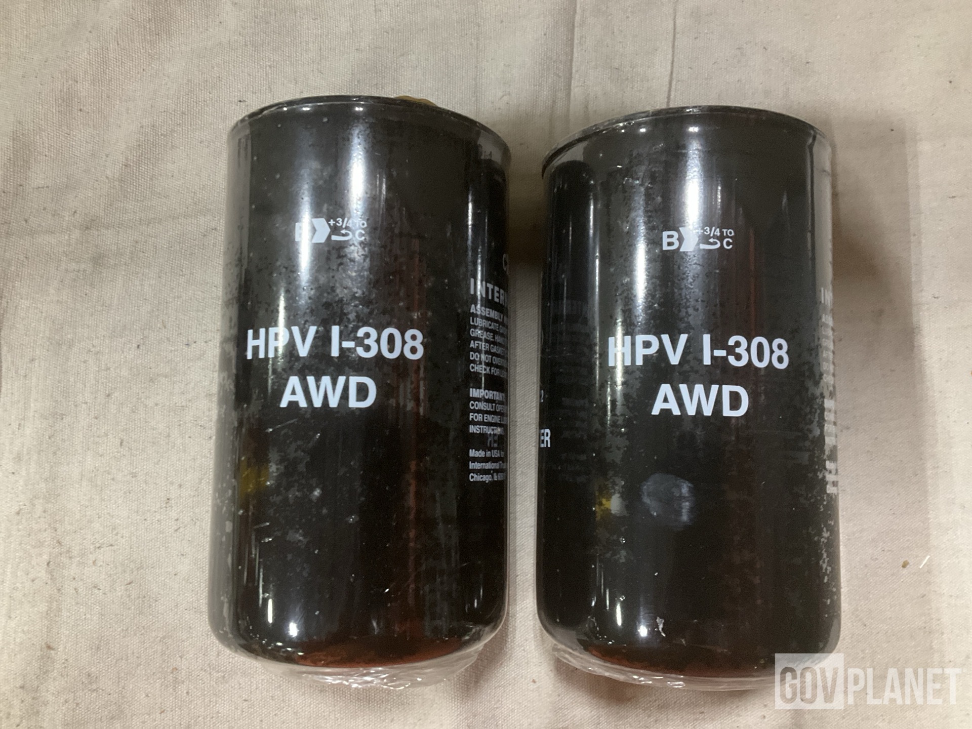 (1) Footrest, (1) Fuel Metering Pump & (18) Oil Filters & Assorted Items