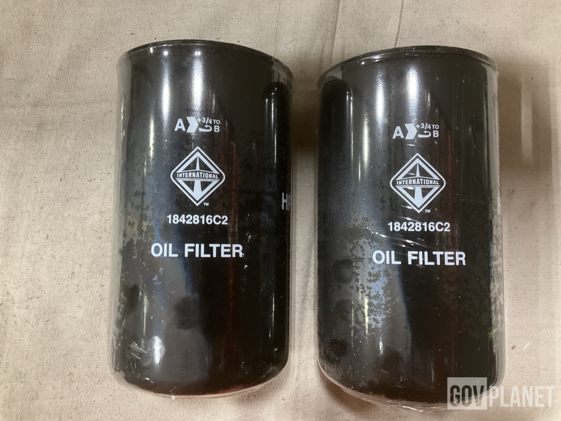 (1) Footrest, (1) Fuel Metering Pump & (18) Oil Filters & Assorted Items