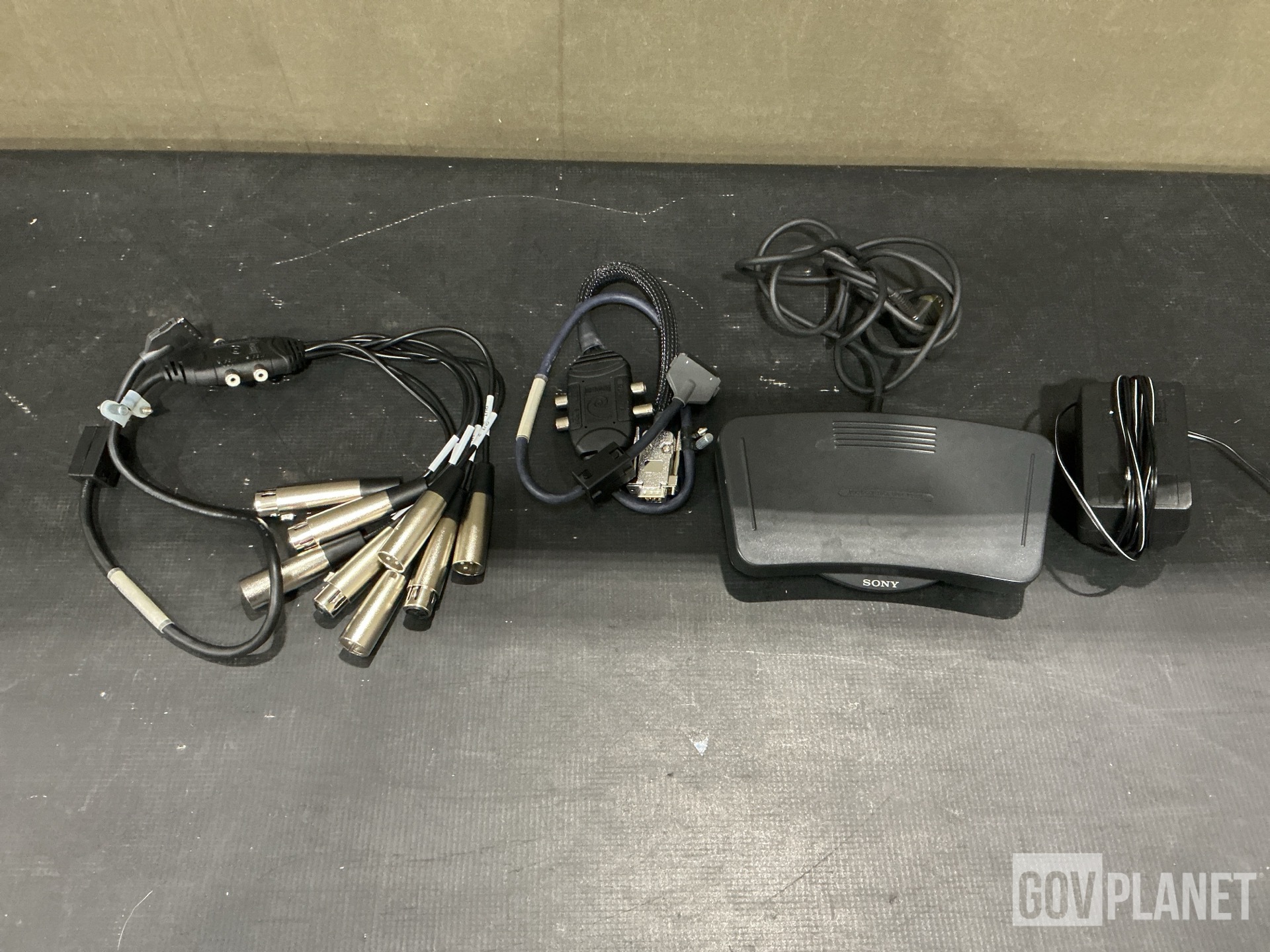 (9) UC Phones, (17) Lamp Guards, (1) Transcriber & Assorted Items
