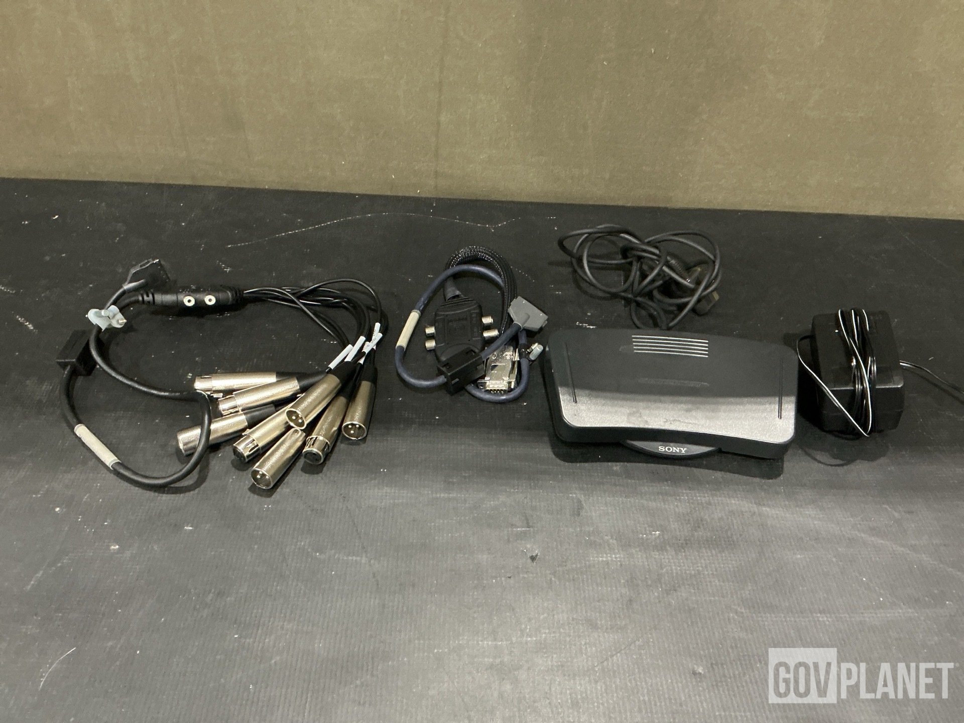 (9) UC Phones, (17) Lamp Guards, (1) Transcriber & Assorted Items