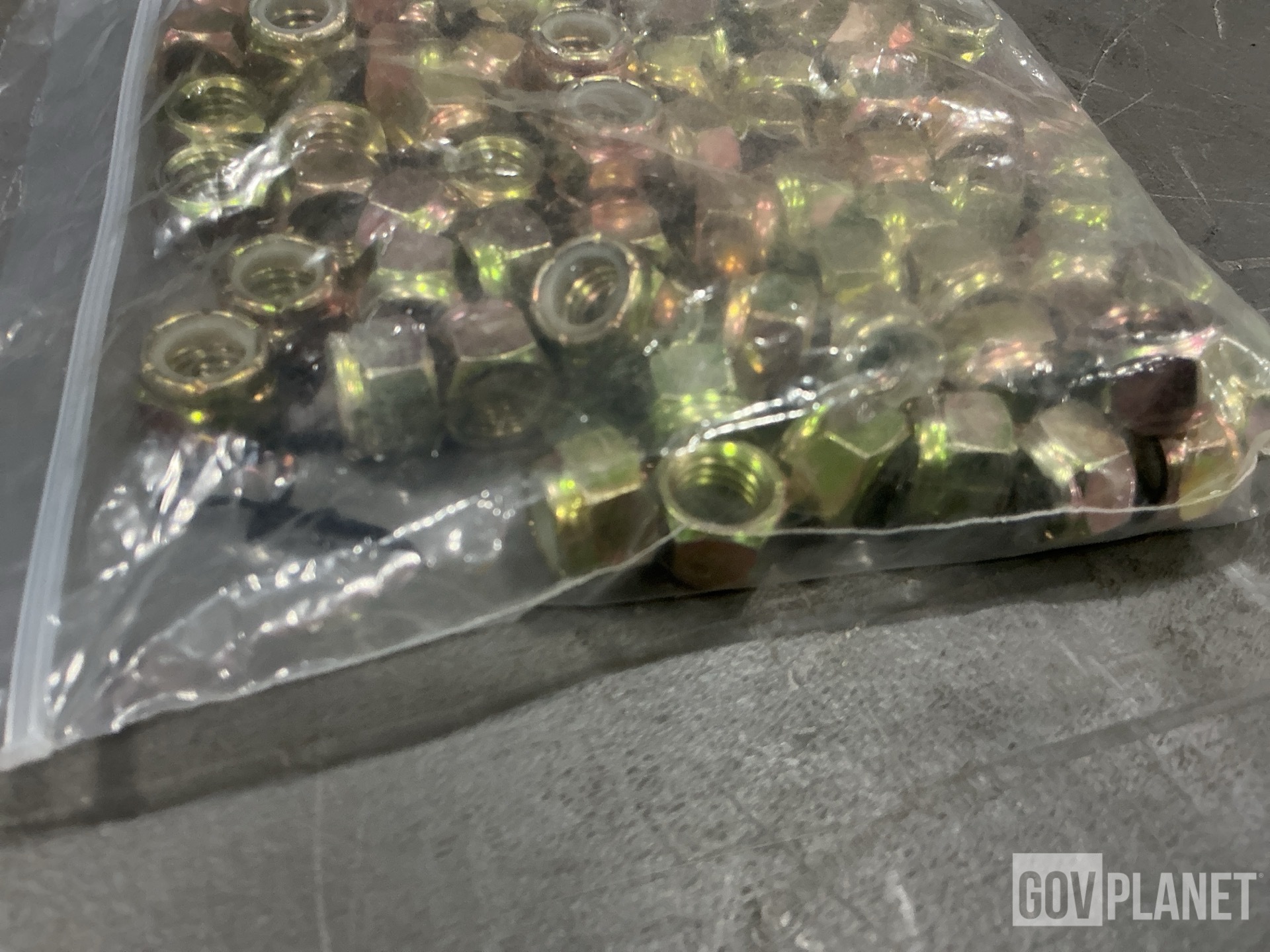 (1) Protective Dust & Moisture Cover, (83) Hexagon Nuts & Assorted Items