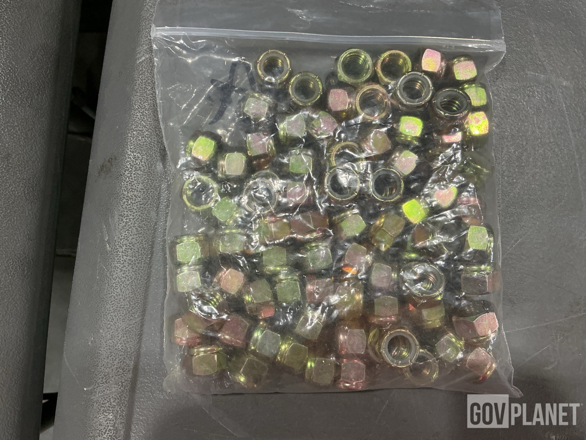 (1) Protective Dust & Moisture Cover, (83) Hexagon Nuts & Assorted Items