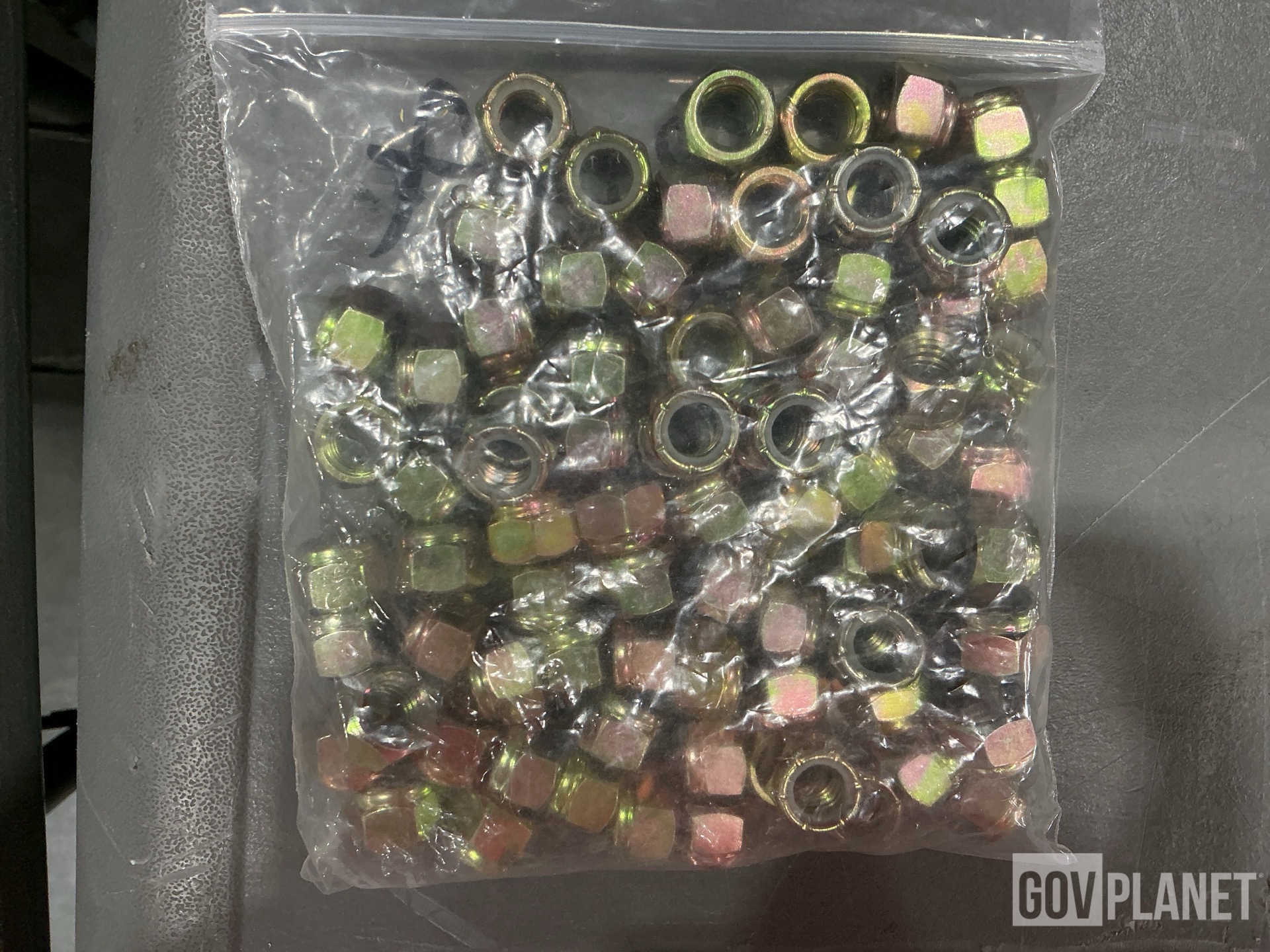 (1) Protective Dust & Moisture Cover, (83) Hexagon Nuts & Assorted Items