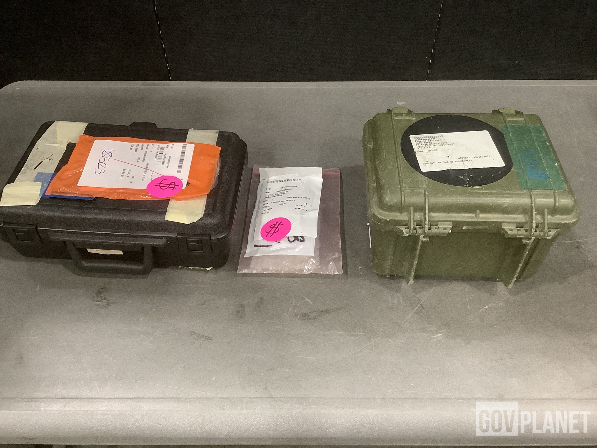 (1) Ball Carrier Screw, (1) Tensiometer, (3) Storage Cases & Assorted Items