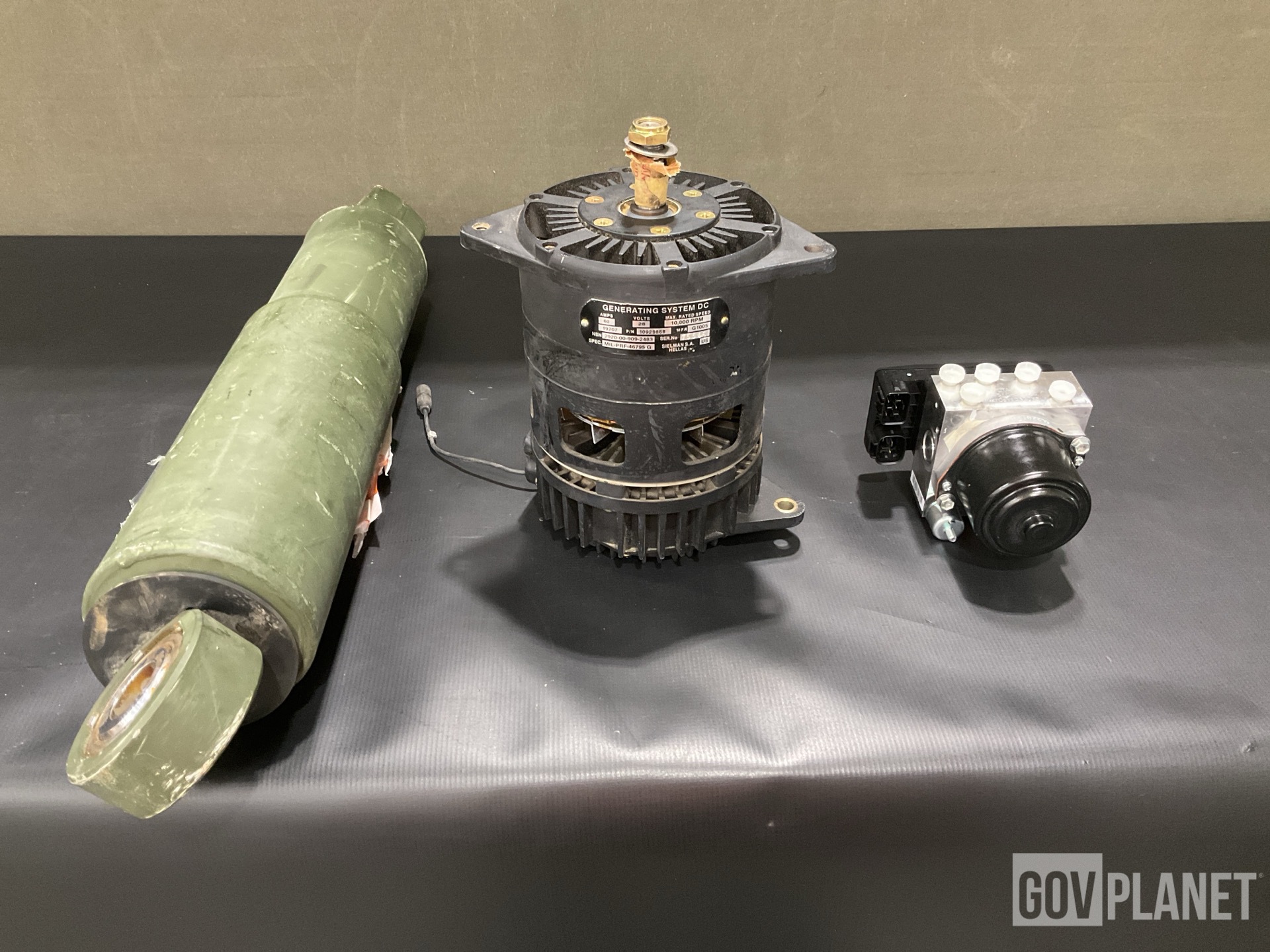 (1) Brake Assembly, (1) Shock Absorber, (1) Generator & Assorted Items
