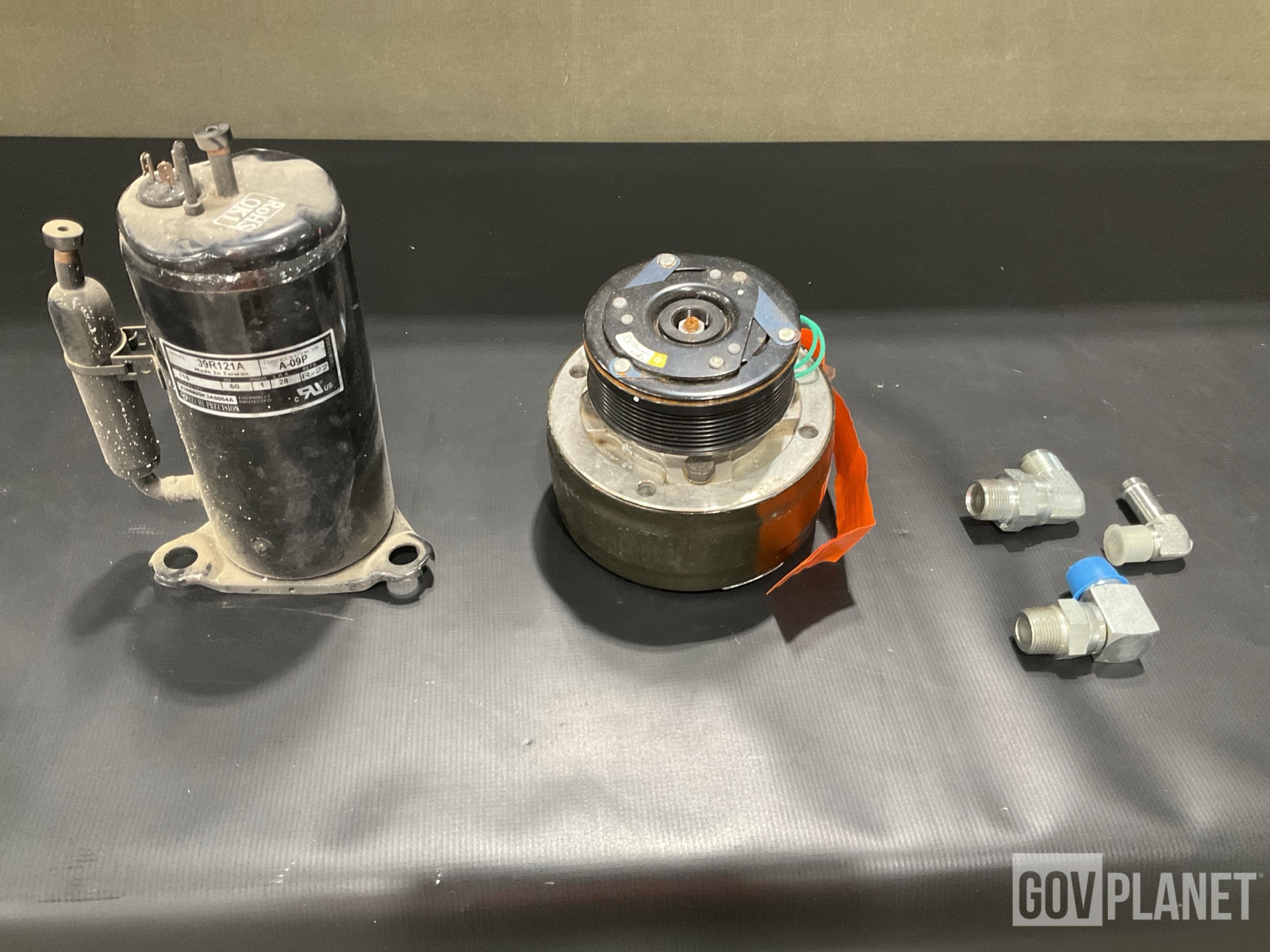 (40) Assorted Hose Adapters, (1) Compressor & Assorted Items